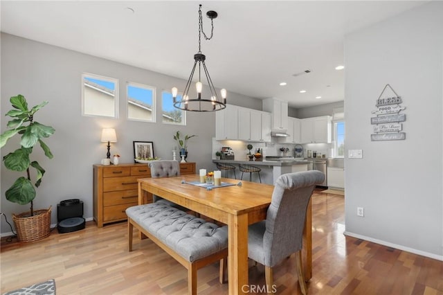 103 Corte Tierra Bella, San Clemente, CA 92673 - dining area with a chandelier, light wood-style floors, recessed lighting, and baseboards