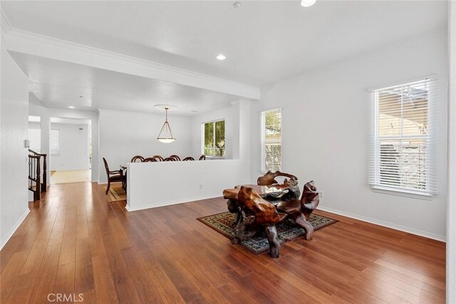 30185 Tenaya Ln, Highland, CA 92346 - dining area featuring wood finished floors, baseboards, crown molding, and recessed lighting