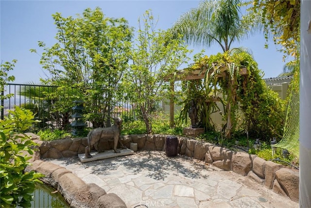 30185 Tenaya Ln, Highland, CA 92346 - fenced backyard featuring a patio