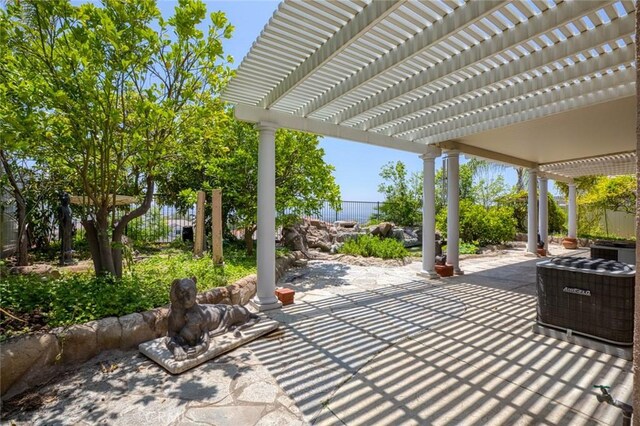 30185 Tenaya Ln, Highland, CA 92346 - view of patio with a pergola and central AC