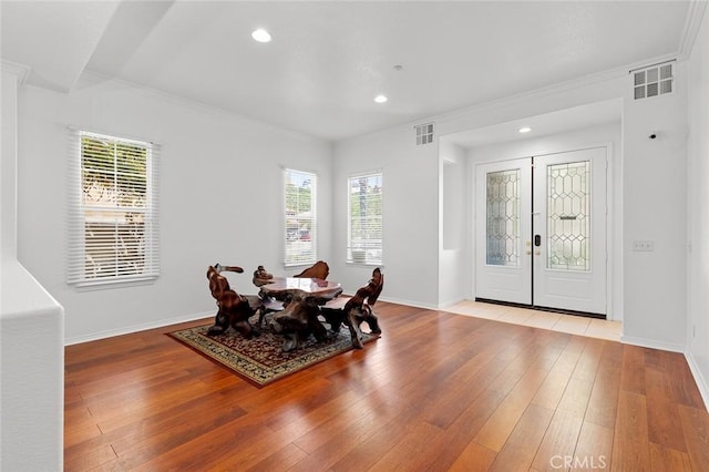 30185 Tenaya Ln, Highland, CA 92346 - dining space with hardwood / wood-style flooring, crown molding, baseboards, and recessed lighting