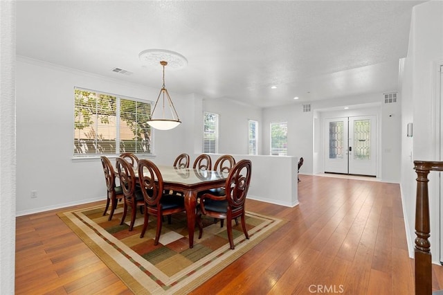 30185 Tenaya Ln, Highland, CA 92346 - dining area with wood-type flooring and baseboards