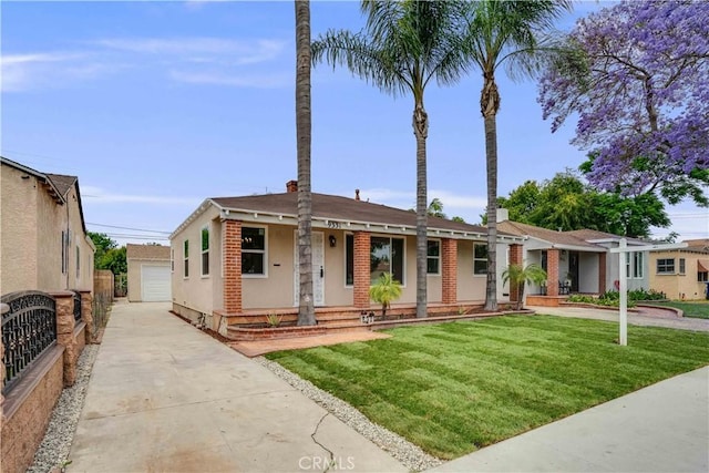 9331 Hunt Ave, South Gate, CA 90280 - view of front of home featuring an outdoor structure, a front lawn, stucco siding, and a porch