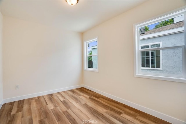 9331 Hunt Ave, South Gate, CA 90280 - unfurnished room featuring light wood-type flooring and baseboards