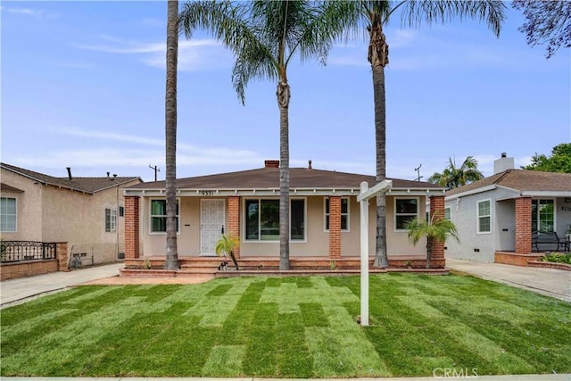 9331 Hunt Ave, South Gate, CA 90280 - view of front of property featuring covered porch and a front yard
