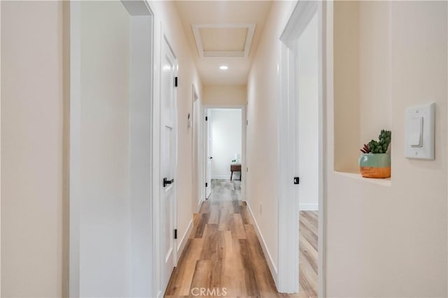 9331 Hunt Ave, South Gate, CA 90280 - hall with light wood-style flooring, recessed lighting, and baseboards