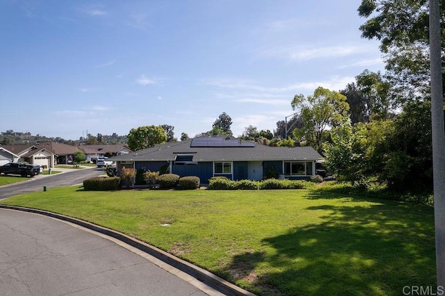 1302 El Corral Ln, San Marcos, CA 92078 - single story home with solar panels and a front yard