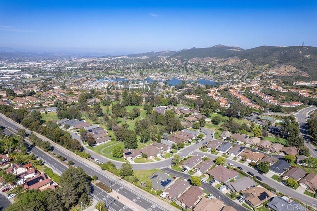1302 El Corral Ln, San Marcos, CA 92078 - aerial view of property's location featuring a water and mountain view and nearby suburban area