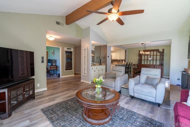 1302 El Corral Ln, San Marcos, CA 92078 - living area featuring a chandelier, light wood finished floors, and ceiling fan