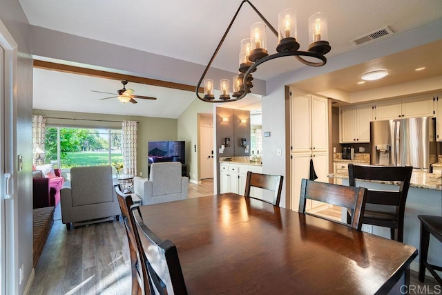 1302 El Corral Ln, San Marcos, CA 92078 - dining area featuring a chandelier, a ceiling fan, wood finished floors, and lofted ceiling