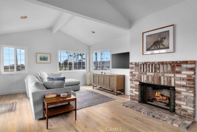 320 W 19th St Unit 1, San Pedro, CA 90731 - living room with wood finished floors, baseboards, and a fireplace