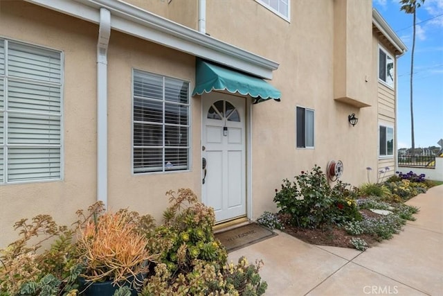 320 W 19th St Unit 1, San Pedro, CA 90731 - doorway to property featuring stucco siding