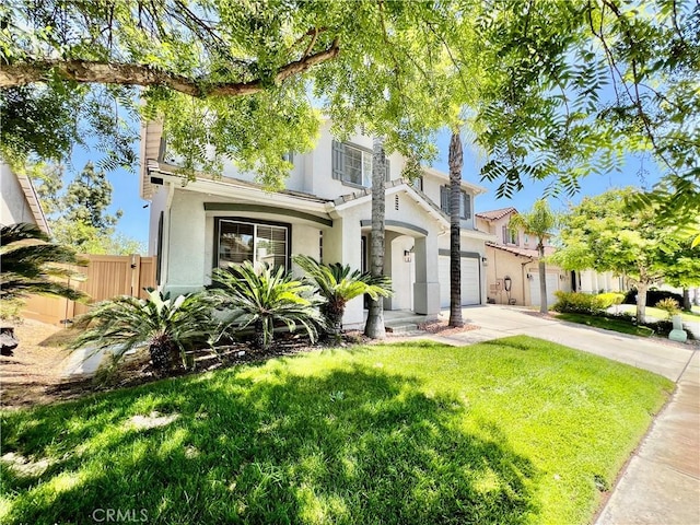 5890 Kendrick Dr, Riverside, CA 92507 - view of front of house with driveway, stucco siding, and a garage