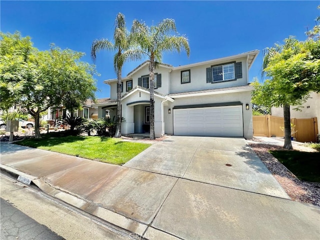 5890 Kendrick Dr, Riverside, CA 92507 - traditional-style house with a garage, stucco siding, and driveway