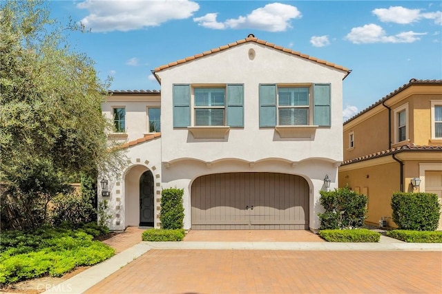 182 Frontier, Irvine, CA 92620 - mediterranean / spanish-style home with stucco siding, a garage, and a tiled roof