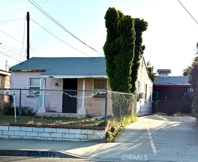 2117 Pine St, Rosemead, CA 91770 - view of front facade featuring a fenced front yard and a shingled roof