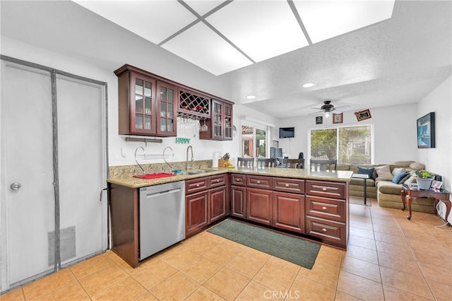 20043 Emerald Meadow Dr, Walnut, CA 91789 - kitchen featuring dishwasher, a peninsula, a sink, a ceiling fan, and a textured ceiling