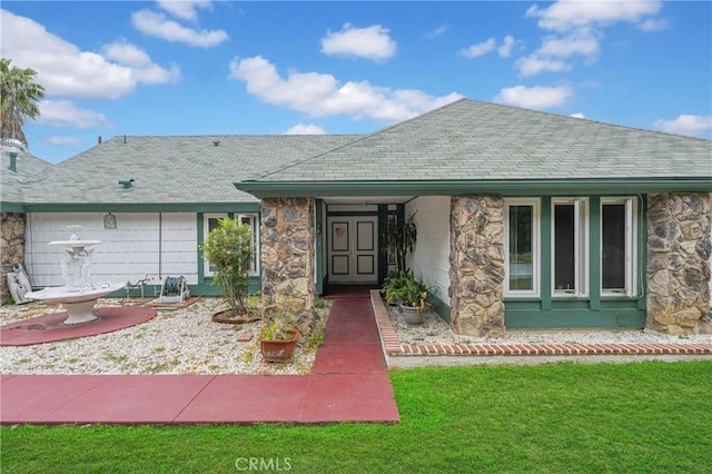 20043 Emerald Meadow Dr, Walnut, CA 91789 - view of front of property featuring stone siding, a front yard, and a shingled roof