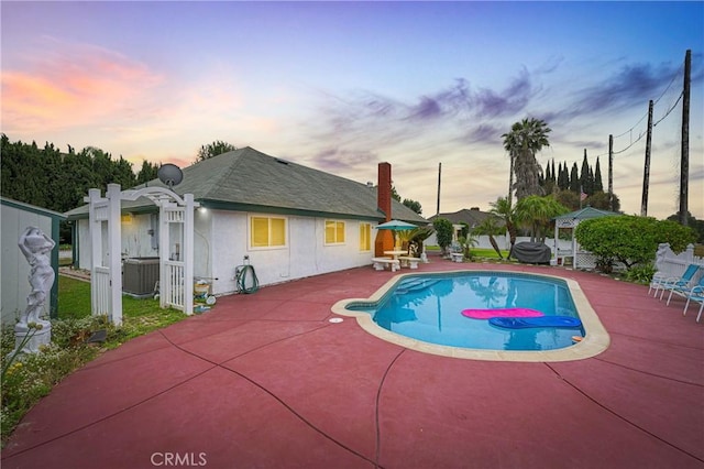 20043 Emerald Meadow Dr, Walnut, CA 91789 - pool at dusk with a patio area and central AC unit