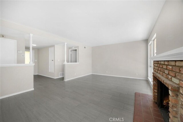 226 Breting Way, Placentia, CA 92870 - unfurnished living room featuring a fireplace and baseboards