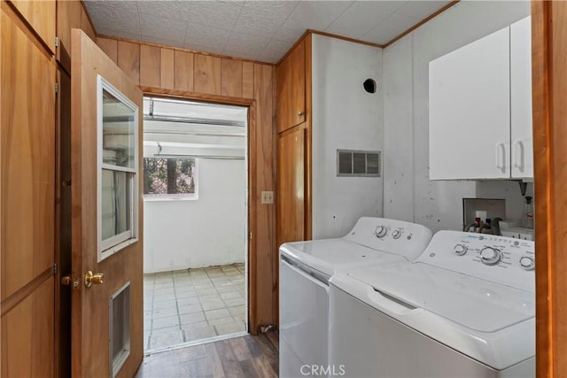 943 Meadowbrook Rd, Lake Arrowhead, CA 92352 - laundry area featuring cabinet space, separate washer and dryer, wood finished floors, and wood walls