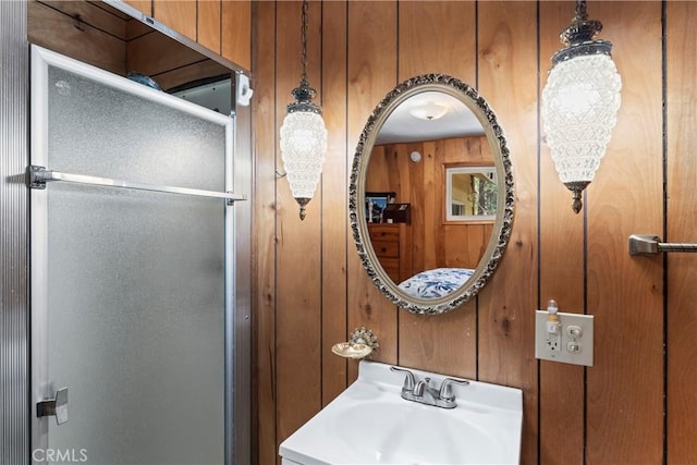 943 Meadowbrook Rd, Lake Arrowhead, CA 92352 - bathroom with a sink, wooden walls, and a shower stall