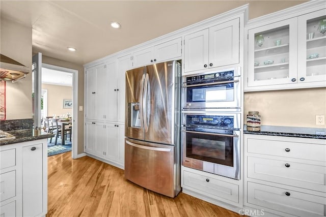 1512 Camino Lindo, South Pasadena, CA 91030 - kitchen featuring stainless steel appliances, white cabinetry, dark stone countertops, glass insert cabinets, and recessed lighting