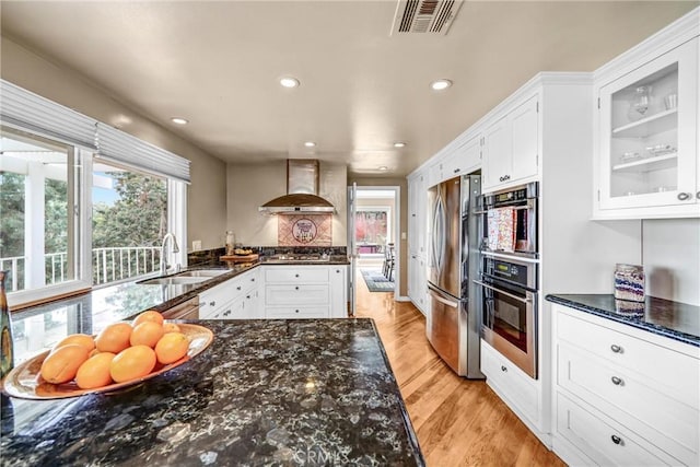 1512 Camino Lindo, South Pasadena, CA 91030 - kitchen featuring wall chimney exhaust hood, appliances with stainless steel finishes, a sink, white cabinetry, and recessed lighting