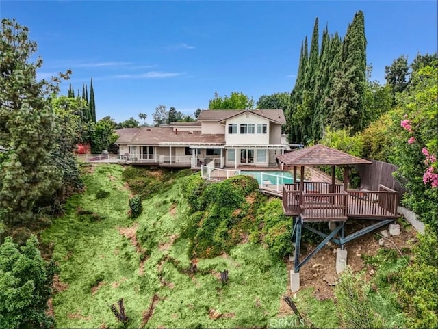 1512 Camino Lindo, South Pasadena, CA 91030 - back of property featuring a wooden deck, a gazebo, and an outdoor pool