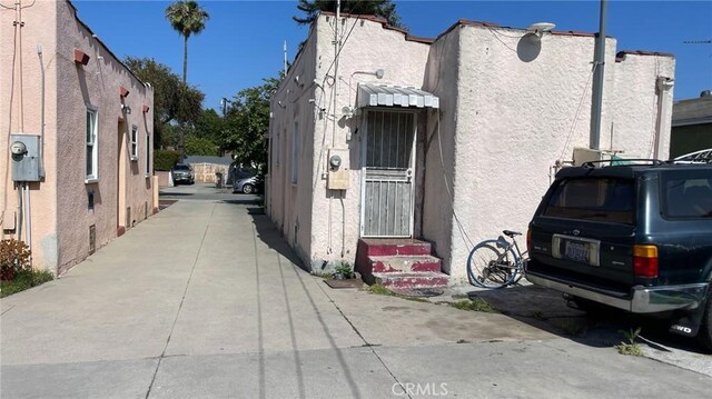 8933 Bowman Ave, South Gate, CA 90280 - view of concrete road featuring entry steps