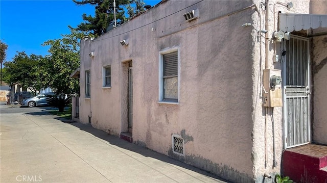8933 Bowman Ave, South Gate, CA 90280 - view of property exterior with stucco siding