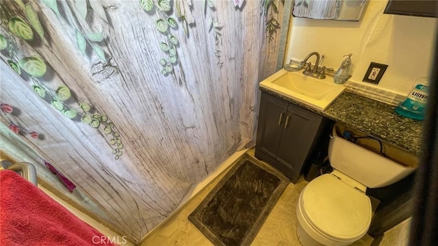 8933 Bowman Ave, South Gate, CA 90280 - full bathroom with vanity, toilet, and a shower with shower curtain