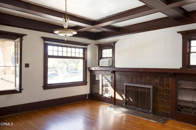 4214 Griffin Ave, Los Angeles, CA 90031 - unfurnished living room with beamed ceiling, wood finished floors, a tiled fireplace, baseboards, and coffered ceiling