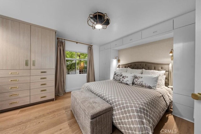 541 1st St, Manhattan Beach, CA 90266 - bedroom with light wood-style flooring and baseboards