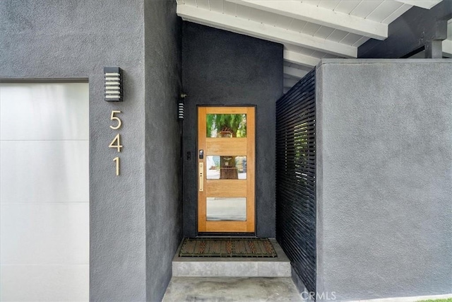 541 1st St, Manhattan Beach, CA 90266 - doorway to property featuring stucco siding