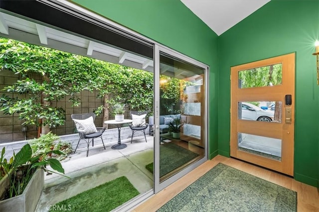 541 1st St, Manhattan Beach, CA 90266 - doorway to outside with wood finished floors and lofted ceiling