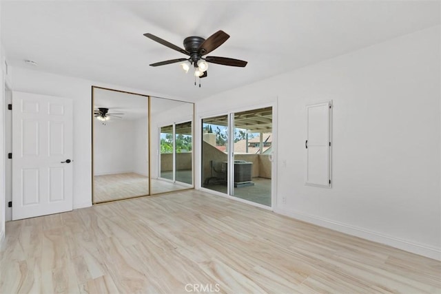 26451 Via Juanita, Mission Viejo, CA 92691 - unfurnished bedroom featuring wood finished floors, a ceiling fan, and baseboards