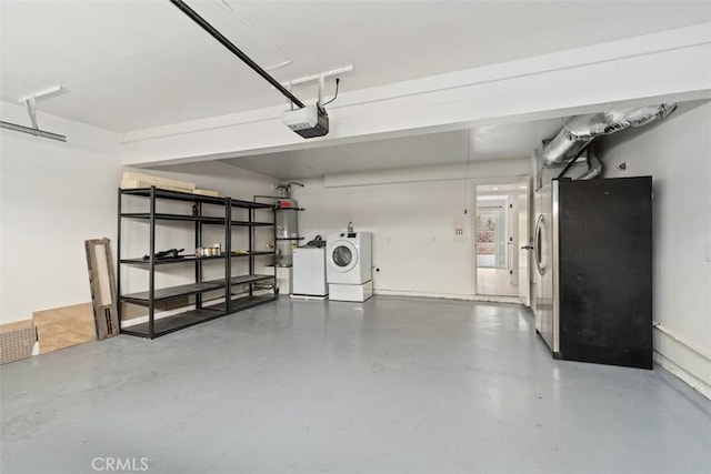 26451 Via Juanita, Mission Viejo, CA 92691 - garage with freestanding refrigerator, a garage door opener, separate washer and dryer, and water heater