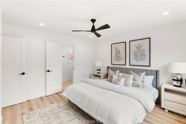 3145 Sicily Ave, Costa Mesa, CA 92626 - bedroom with light wood finished floors, recessed lighting, a ceiling fan, and baseboards