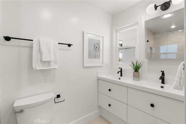 3145 Sicily Ave, Costa Mesa, CA 92626 - full bath with toilet, double vanity, baseboards, and tiled shower
