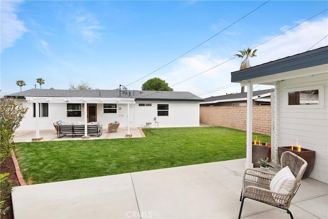 3145 Sicily Ave, Costa Mesa, CA 92626 - rear view of house featuring a patio area, an outdoor hangout area, and stucco siding