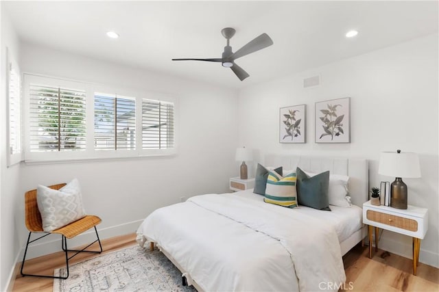 3145 Sicily Ave, Costa Mesa, CA 92626 - bedroom with baseboards, wood finished floors, recessed lighting, and ceiling fan