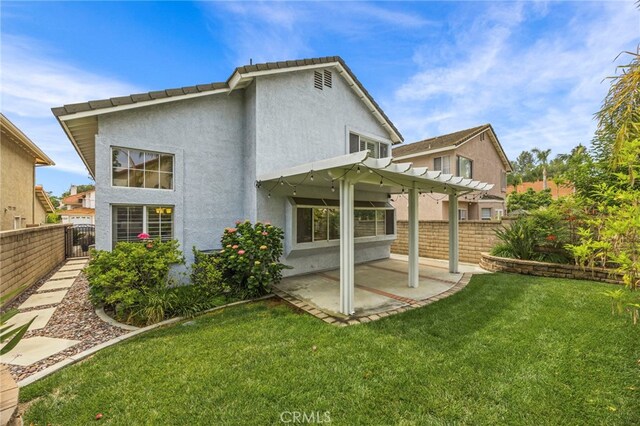 14252 Parkside Ct, Chino Hills, CA 91709 - back of house with a patio area, stucco siding, and a pergola