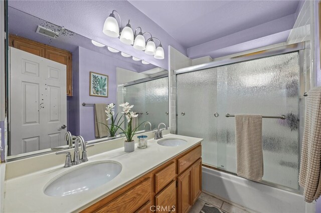 14252 Parkside Ct, Chino Hills, CA 91709 - full bath featuring combined bath / shower with glass door, double vanity, and tile patterned floors