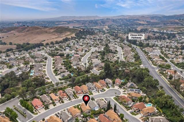 14252 Parkside Ct, Chino Hills, CA 91709 - aerial view of property and surrounding area featuring a mountainous background and nearby suburban area