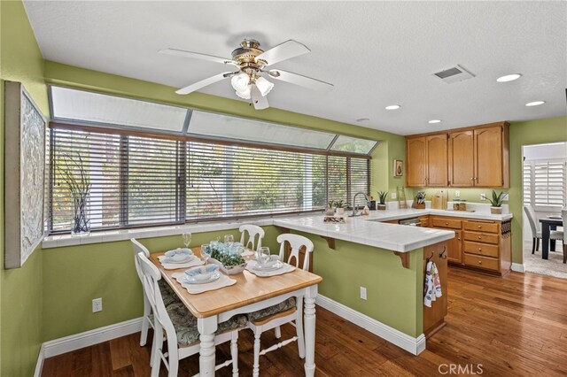 14252 Parkside Ct, Chino Hills, CA 91709 - kitchen featuring a peninsula, healthy amount of natural light, baseboards, a sink, and recessed lighting
