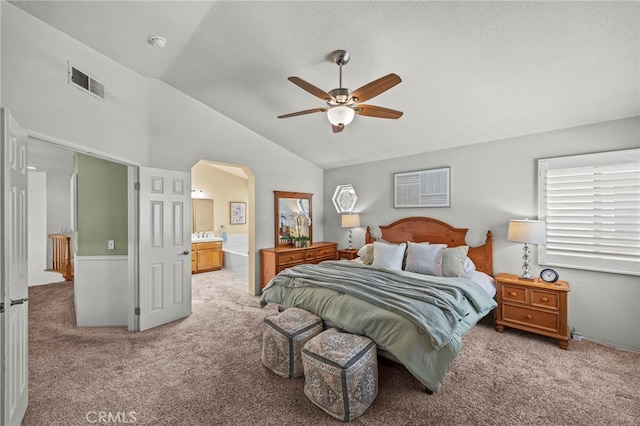 14252 Parkside Ct, Chino Hills, CA 91709 - carpeted bedroom with lofted ceiling, arched walkways, connected bathroom, ceiling fan, and a textured ceiling