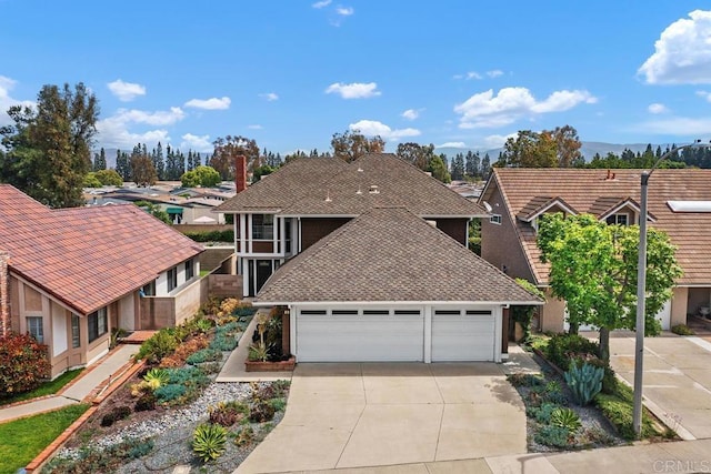 6 Cape Cod, Irvine, CA 92620 - view of front of property featuring driveway, a residential view, and an attached garage