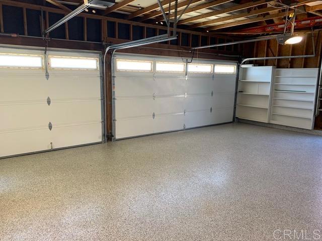6 Cape Cod, Irvine, CA 92620 - garage featuring a garage door opener