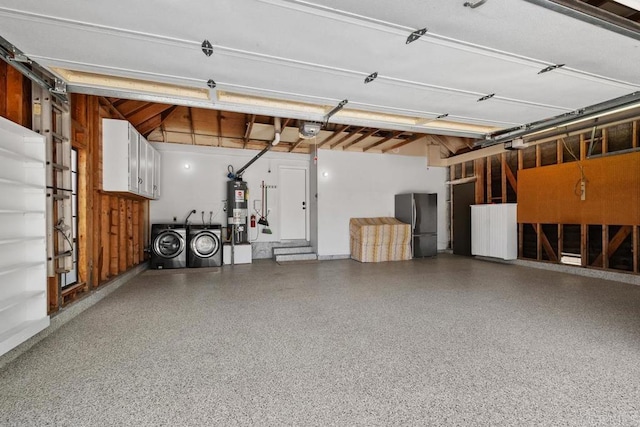 6 Cape Cod, Irvine, CA 92620 - garage featuring washer and dryer, water heater, freestanding refrigerator, and a garage door opener
